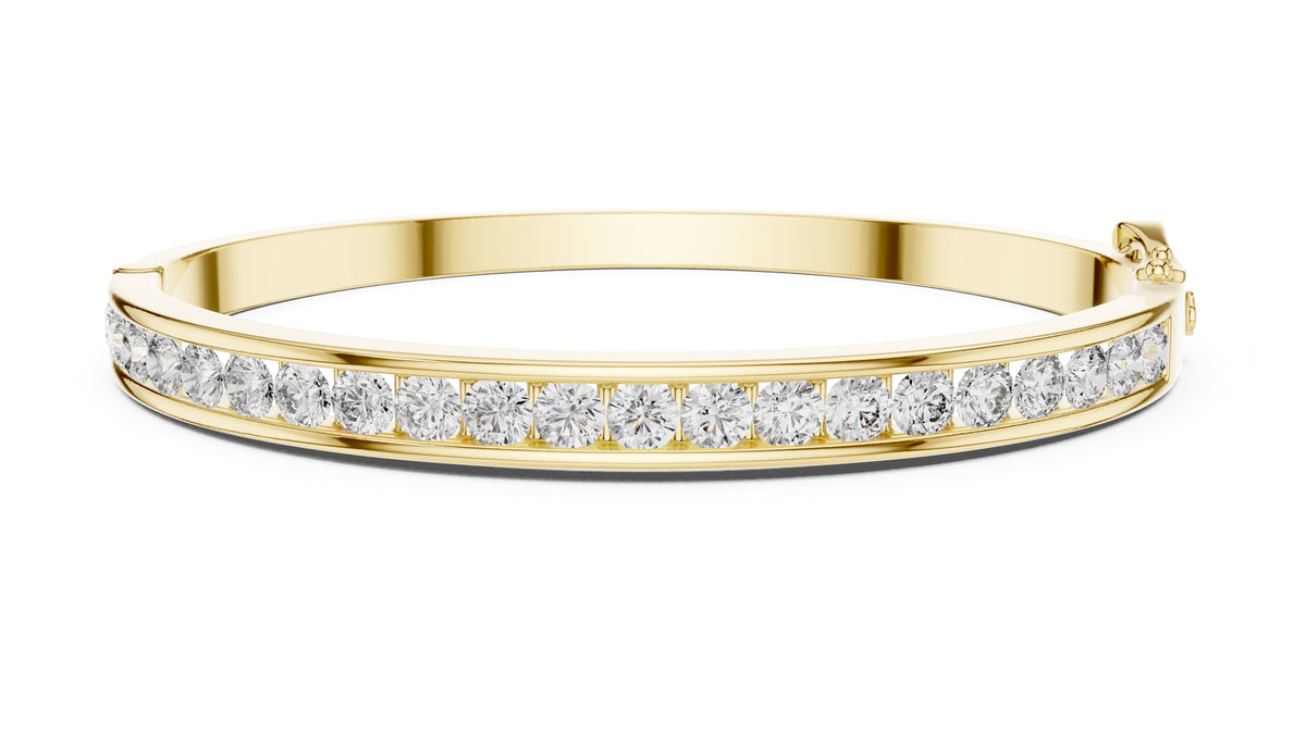 The Continuum Channel Bangle Yellow Gold